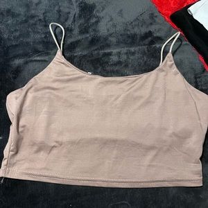 cropped light brown tank top. size medium